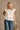 Colette Cream Peplum Flare Sleeveless Top- front top view
