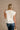 Colette Cream Peplum Flare Sleeveless Top- close up back view