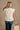 Colette Cream Peplum Flare Sleeveless Top- back view