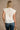 Colette Cream Peplum Flare Sleeveless Top- full back view