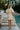 Delaney Cream Belted Puff Sleeve Mini Dress - full body back view
