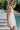Chantel White Bow Back Mini Dress - side view