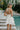 Chantel White Bow Back Mini Dress - back view