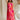 Full body view of female model wearing the Luna Orange & Fuchsia Floral Maxi Dress which features Fuchsia, Red Orange and Linen Floral Print, Linen Lining, Strapless, Back Tie Detail and Maxi Length