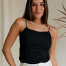 front view of female model wearing the Evie Black Ruched Tank which features Black Mesh Fabric, Black Lining, Ruched Details, Square Neckline and Adjustable Straps