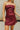 Front view of female model wearing the Anya Burgundy Faux-Leather Strapless Dress that has burgundy faux-leather fabric, a strapless neck, and mini-length hem.