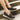 Close up side view of female model's legs; model is wearing the Literally Loafer in Grey Faux Suede