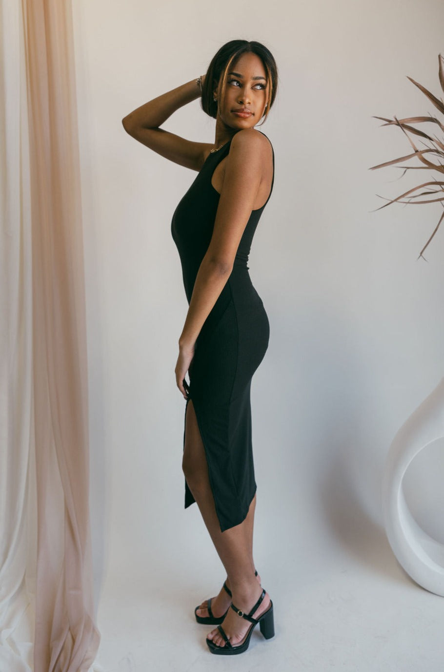 Rochelle Black Bodycon Sleeveless Midi Dress - Lizard Thicket Rochelle Black Bodycon Sleeveless Midi Dress - Lizard Thicket
