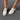 Image show's top view of models feet; model is wearing the Wingin It Ivory Snake Mule Loafers