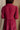 Upper back view of female model wearing the Penny Button Up 3/4 Sleeve Midi Dress in Berry that has a button up front, 3/4 sleeves, and a collar.