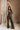 Full body front view of female model wearing the Britney Olive Wide Leg Jumpsuit.