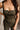 Close up front view of female model wearing the Britney Olive Wide Leg Jumpsuit.