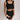 Front view of female model wearing the Giselle Black Shorts with matching top.