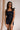 Model is pictured wearing the Tianna Romper in a size small.