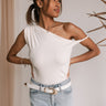 Model is pictured wearing the Rhett One Shoulder Top.