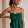 Model is pictured wearing the Hunter Strapless top in a size small.