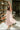 Lina Rust & Cream Striped Midi Dress - twirling side view