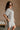 Arya White & Black Stripe Mini Dress- side view