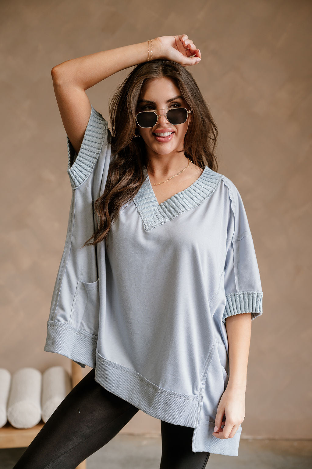 Kinsley Light Blue Short Sleeve Top - front view with arm raised