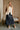 Veronica Navy Belted Faux Leather Midi Skirt - full body front view