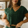 Upper body front view of female model wearing the Sutton Green Knit Top