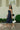 Lilia Navy Polka Dot Scarf Midi Dress - full body side view
