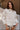 Nyla Cream Denim Drawstring Jacket- close up top view