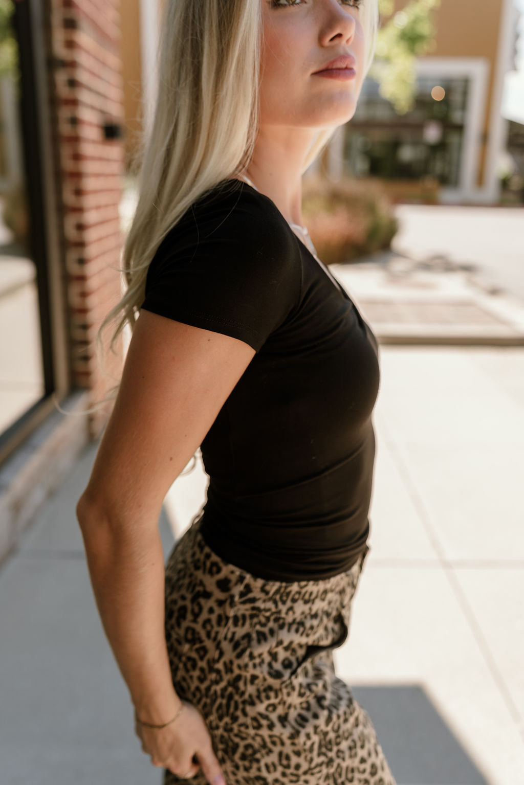 Alaina Black Short Sleeve Top- close up frontal side view