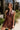 Everlee Burgundy Faux Leather Halter Romper- front view
