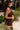 Everlee Burgundy Faux Leather Halter Romper- close up side view