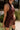 Everlee Burgundy Faux Leather Halter Romper- frontal side view