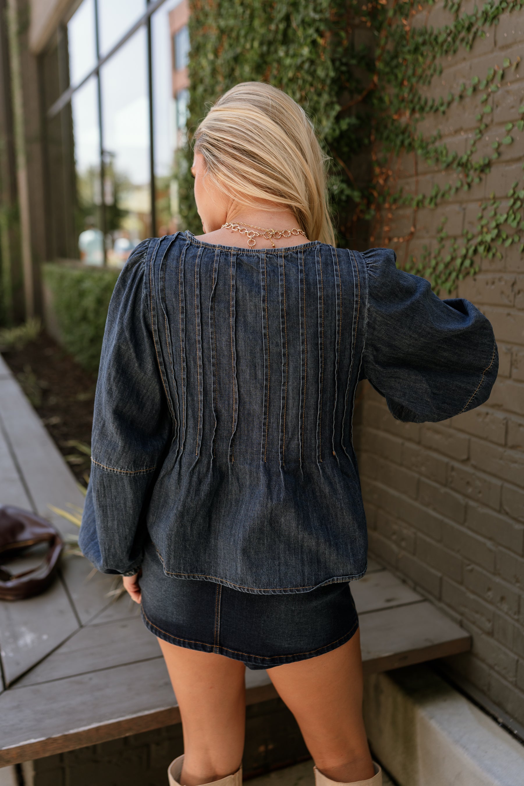Lena Dark Denim Pleated Flare Long Sleeve Top- close up back view
