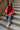 Jeanie Red Coral Balloon Sleeve Sweater - full body sitting view