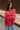 Jeanie Red Coral Balloon Sleeve Sweater - front view (arms crossed)