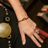 Leah Gold Medallion Bracelet - close up on model's wrist