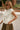 Bristol Cream Button-Up Sleeveless Sweater - side view