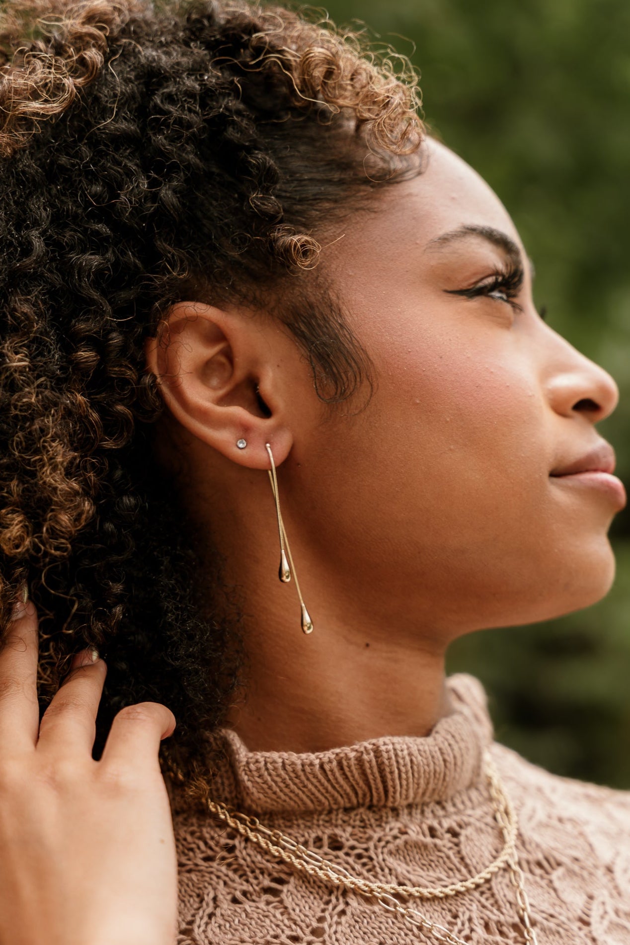Kayla Gold Teardrop Earrings - side view on model