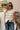 Kiera Cream & Black Button-Up Sleeveless Sweater - front view