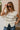 Kiera Cream & Black Button-Up Sleeveless Sweater - close front view