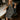 Virginia Black & White Polka Dot Midi Dress - full body sitting view