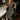 Virginia Black & White Polka Dot Midi Dress - full body sitting view