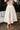 Kyra Cream Flare Midi Skirt- close up front view