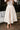 Kyra Cream Flare Midi Skirt- close up front view