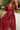 Estella Deep Rust Eyelet Zip-Up Midi Dress- close up front top view