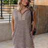 Upper body front view of female model wearing the Katherine Taupe & Navy Striped Dress.