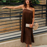 Full body front view of female model wearing the Kristi Brown Maxi Dress