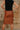 Evie Cognac Faux Leather Midi Skirt- close up back view
