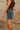 Lena Denim Studded Frayed Mini Skirt- side view