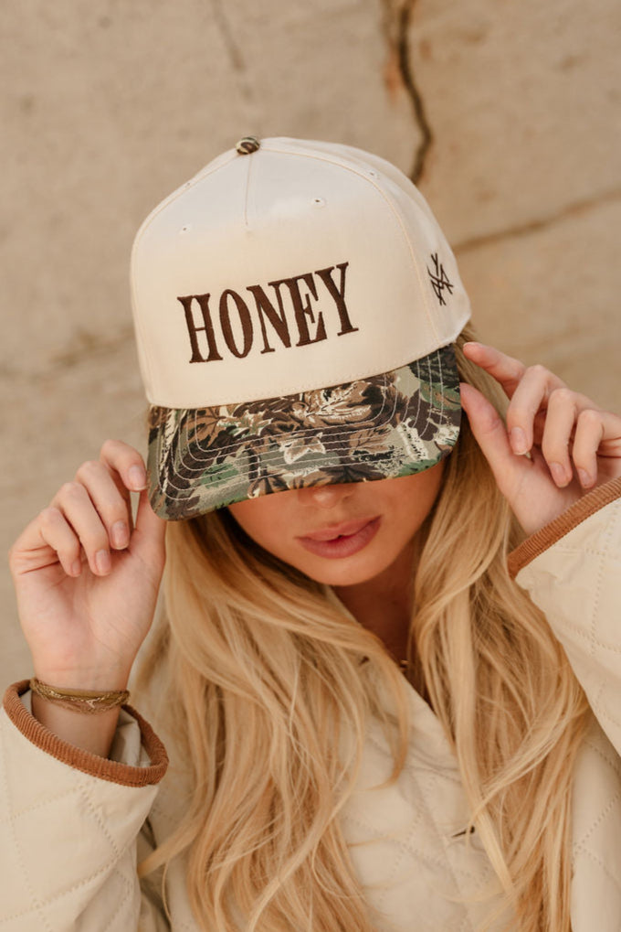 Honey Tan & Camo Trucker Hat- front view on model