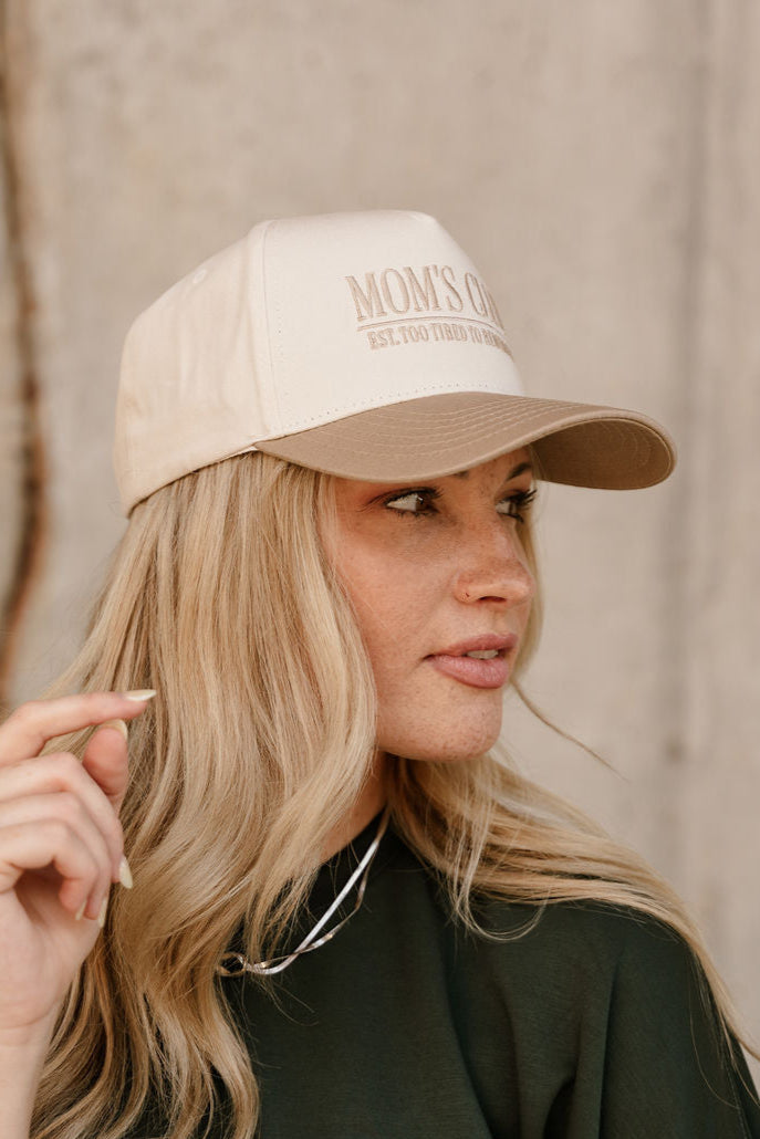 Mom's Club Too Tired To Remember Trucker Hat - side view on model